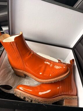Angela ScottOrange Patent Leather Chelsea Booties